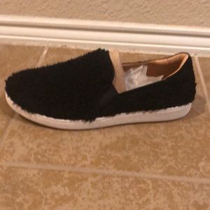 UGG Ricci  Black faux-fur slip-on sneaker size 10